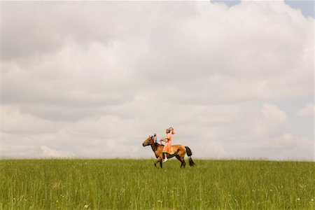 simsearch:700-02263889,k - Boy Participating in Horse Race to Declare His Adulthood at the Naadam Festival, Xiwuzhumuqinqi, Inner Mongolia, China Stock Photo - Rights-Managed, Code: 700-02265770