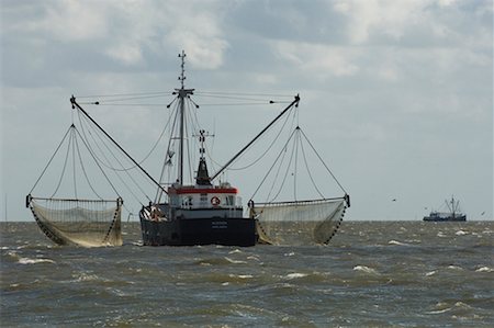 Shrimp Fishing Boat on Water, Friesland, Netherlands Stock Photo - Rights-Managed, Code: 700-02260170