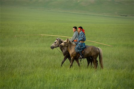 Horsemen in Grasslands, Inner Mongolia, China Stock Photo - Rights-Managed, Code: 700-02263887