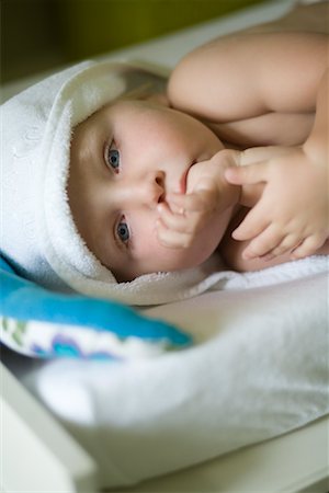 Baby Lying on Change Table Stock Photo - Rights-Managed, Code: 700-02289322