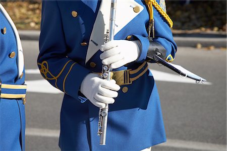 picture of the blue playing a instruments - Flautist with Flute in Parade Stock Photo - Rights-Managed, Code: 700-02347787