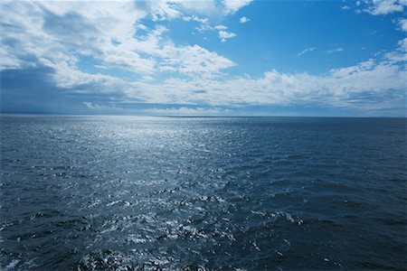 Blue Sky Over Ocean Foto de stock - Con derechos protegidos, Código: 700-02347832