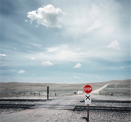 road and stop sign - Railroad Crossing, Sand Hills, Nebraska, USA Stock Photo - Rights-Managed, Code: 700-02348007