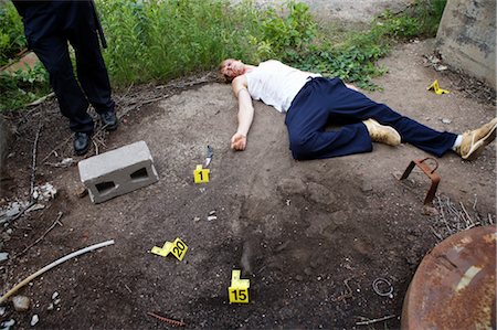 Police Officer by Evidence and Corpse on Crime Scene, Toronto, Ontario, Canada Stock Photo - Rights-Managed, Code: 700-02348261