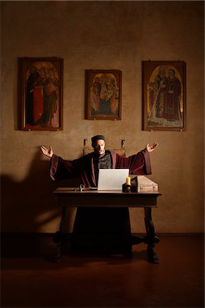 reaction - Medieval Man with Laptop Computer, Mugello, Tuscany, Italy Stock Photo - Rights-Managed, Code: 700-02376720