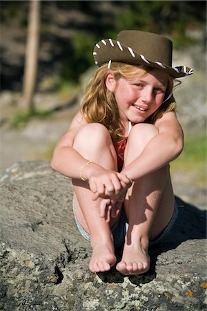 Portrait of Girl Wearing Cowboy Hat, Yellowstone National Park, Wyoming, USA Stock Photo - Rights-Managed, Code: 700-02371215