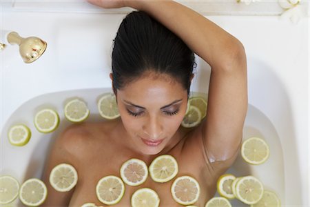 Woman in Bathtub with Lime Slices Stock Photo - Rights-Managed, Code: 700-02371423