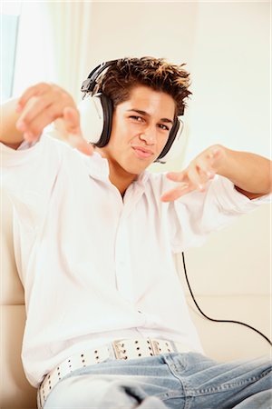 Teenager Listening to Music Stock Photo - Rights-Managed, Code: 700-02371631