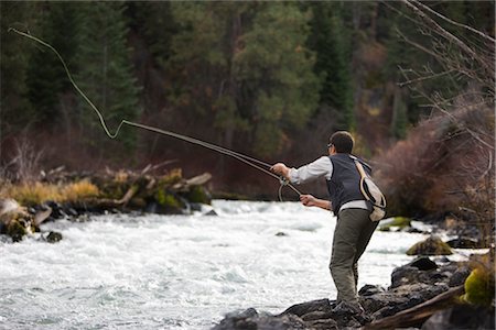Man Fly Fishing on the Deschutes River, Bend, Oregon, USA Stock Photo - Rights-Managed, Code: 700-02386058