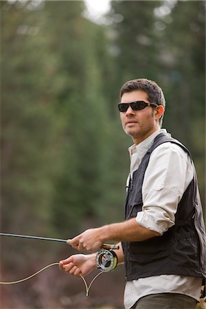 Man Fly Fishing on the Deschutes River, Bend, Oregon, USA Stock Photo - Rights-Managed, Code: 700-02386059