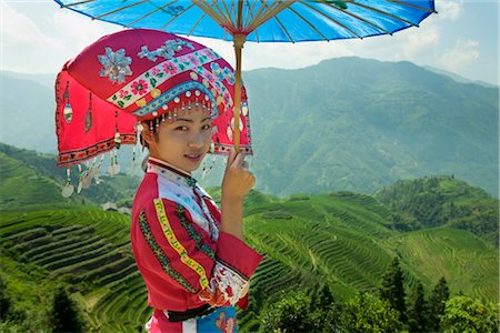 Woman Wearing Indigenous Costume, Ping An Village, Longsheng, China Stock Photo - Rights-Managed, Code: 700-02386251