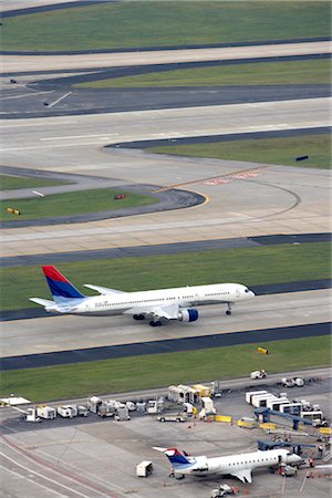 Airplane on Runway, Hartsfield- Jackson International Airport, Atlanta, Georgia, USA Stock Photo - Rights-Managed, Code: 700-02418143