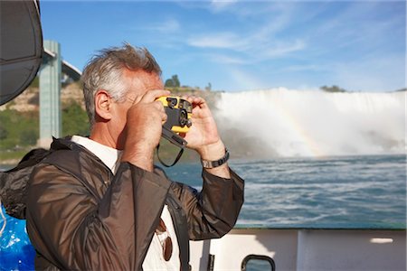 Man Taking Pictures of Niagara Falls, Ontario, Canada Stock Photo - Rights-Managed, Code: 700-02593645