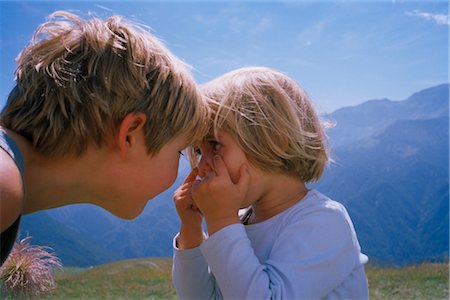 simsearch:700-02724695,k - Brother and Sister Making Faces at One Another, Italy Stock Photo - Rights-Managed, Code: 700-02593848