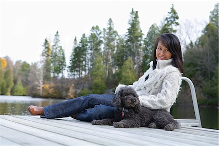 Woman on Dock with Dog Stock Photo - Rights-Managed, Code: 700-02637175