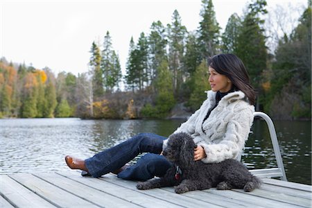 Woman on Dock with Dog Stock Photo - Rights-Managed, Code: 700-02637176