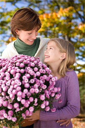 Mother and Daughter with Potted Plant Stock Photo - Rights-Managed, Code: 700-02637929