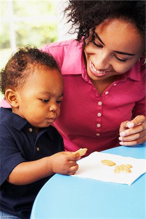 simsearch:700-02586125,k - Toddler Eating Cookies with Mother Stock Photo - Rights-Managed, Code: 700-02637951