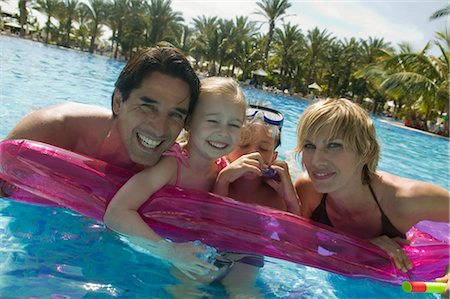 summer vacation - Family Floating on Air Mattress Stock Photo - Rights-Managed, Code: 700-02645894