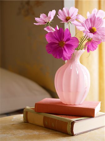 stack of books - Purple Flowers in Vase on Bedside Table Stock Photo - Rights-Managed, Code: 700-02669204