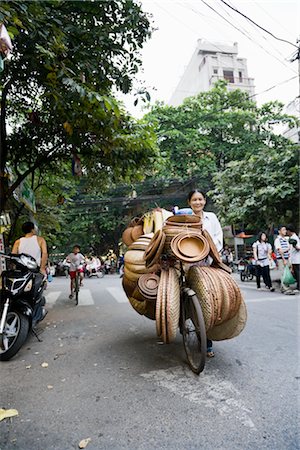 riding bike with basket - Basket Vendor in Street, Old Quarter, Hanoi, Vietnam Stock Photo - Rights-Managed, Code: 700-02669404