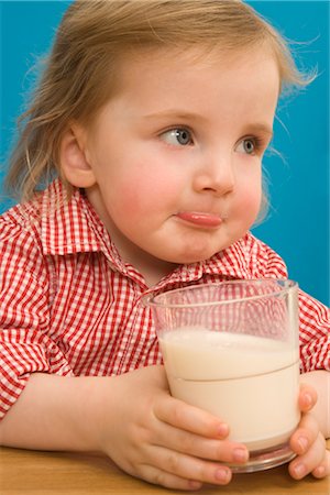 Girl Drinking Milk Stock Photo - Rights-Managed, Code: 700-02669988