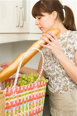 Woman Putting Away Groceries Stock Photo - Rights-Managed, Code: 700-02670020