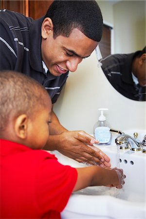 family bathroom mirror - Father and Son Washing Hands in Sink Stock Photo - Rights-Managed, Code: 700-02670116