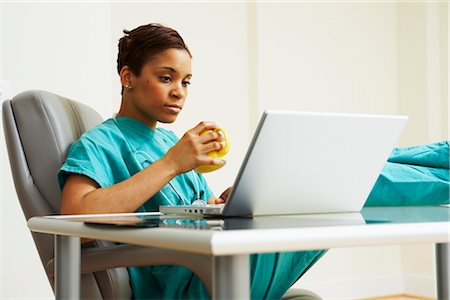 Doctor in Office Using Laptop Computer Stock Photo - Rights-Managed, Code: 700-02670507