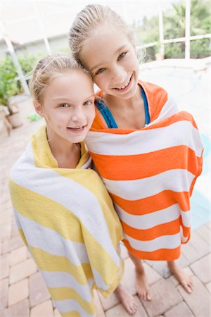 preteen swim - Girls by Swimming Pool Stock Photo - Rights-Managed, Code: 700-02670789
