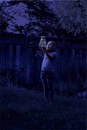 simsearch:700-00477662,k - Girl Looking at Jar of Fireflies at Night Stock Photo - Rights-Managed, Code: 700-02698411