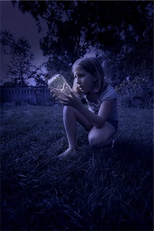 simsearch:700-00477662,k - Girl Looking at Jar of Fireflies at Night Stock Photo - Rights-Managed, Code: 700-02698413