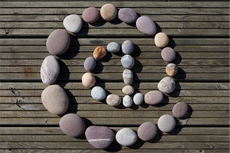 @ Symbol Made of Pebbles Stock Photo - Rights-Managed, Code: 700-02693502