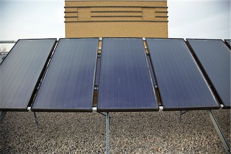 environmental issues and alternative energy - Solar Panels on Roof, Toronto, Ontario, Canada Stock Photo - Rights-Managed, Code: 700-02700233