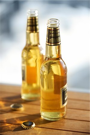 Beer Bottles on Table Stock Photo - Rights-Managed, Code: 700-02701364
