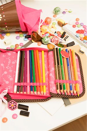 pencil crayon - Open Pencil Case and Spilled Candy Stock Photo - Rights-Managed, Code: 700-02756416