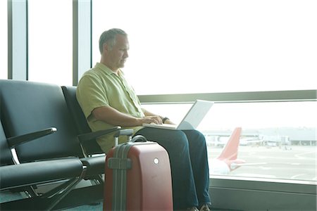 Man Using Laptop, San Francisco International Airport, San Francisco, California, USA Foto de stock - Con derechos protegidos, Código: 700-02797979