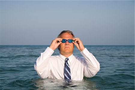 Homme d'affaires dans l'océan Photographie de stock - Rights-Managed, Code: 700-02797988