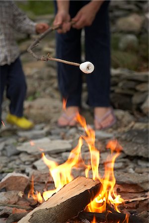 Mother and Toddler Roasting Marshmallows on a Rocky Beach, Prince Edward County, Ontario, Canada Stock Photo - Rights-Managed, Code: 700-02791659