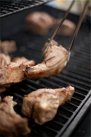 Barbecuing Organic Lamb Chops Seasoned With Mustard Seed Stock Photo - Rights-Managed, Code: 700-02791664