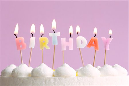 simsearch:600-02461257,k - Birthday Candles on Cake Stock Photo - Rights-Managed, Code: 700-02801154