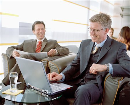 executive in the chair - Business People Waiting in Airport Lounge Stock Photo - Rights-Managed, Code: 700-02887155