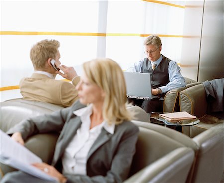 Business People Waiting in Airport Lounge Stock Photo - Rights-Managed, Code: 700-02887150