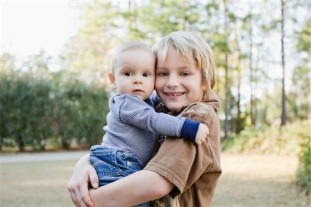 Boy Holding Baby Brother Stock Photo - Rights-Managed, Code: 700-02883113