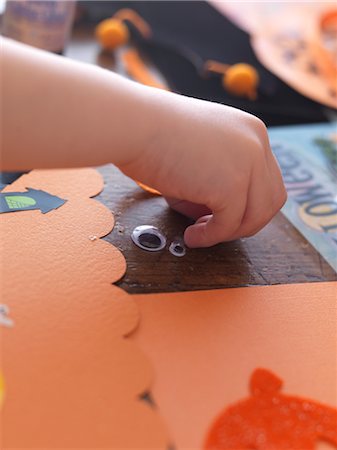 Child Making Halloween Crafts Stock Photo - Rights-Managed, Code: 700-02912407