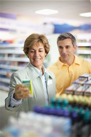 Pharmacist Helping Customer Stock Photo - Rights-Managed, Code: 700-02912450