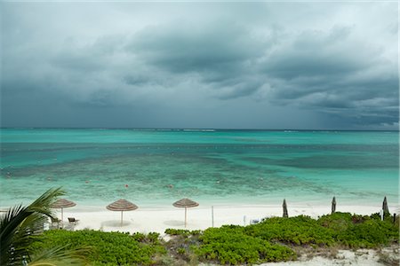 Coral Reef and Beach with Thunderstorm Rolling In, Turks and Caicos Stock Photo - Rights-Managed, Code: 700-02922909