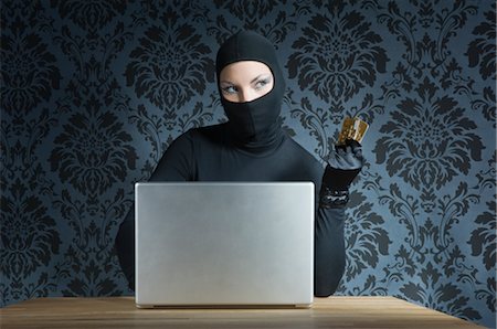 Woman Dressed in Black with Laptop Stock Photo - Rights-Managed, Code: 700-02935715