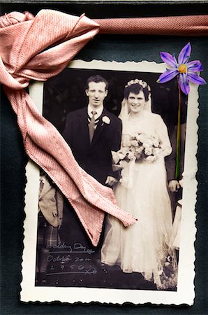 photographic print - Old Wedding Photo in Album with Ribbon and Pressed Flower Stock Photo - Rights-Managed, Code: 700-02967805