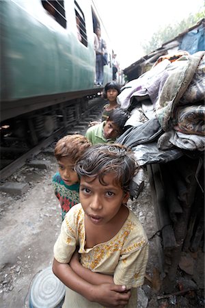 slum - Boys near Train Tracks, Tilijara, Kolkata, West Bengal, India Stock Photo - Rights-Managed, Code: 700-03004183